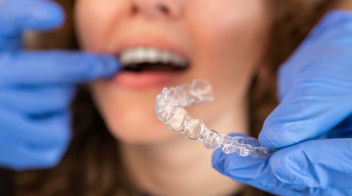 The More You Know: What’s the Difference Between Invisalign & Clear Braces?